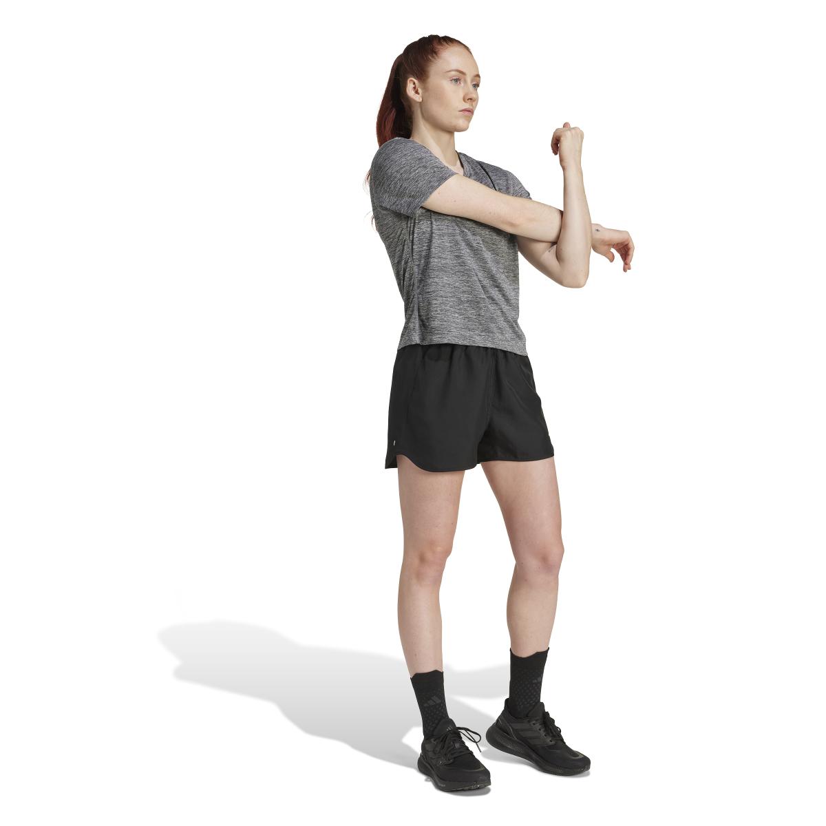 product/2/0/2025_adidas_jl8722_4_apparel_on_model_walking_view_white.jpg
